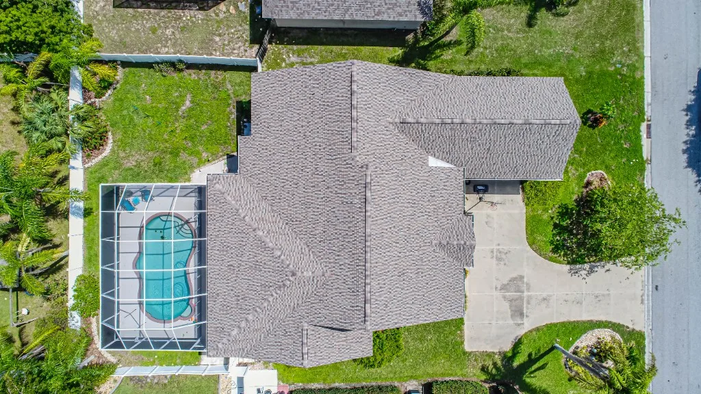 Stronghold Roofing completed a tan shingle roof on this ranch home in Clearwater, FL.
