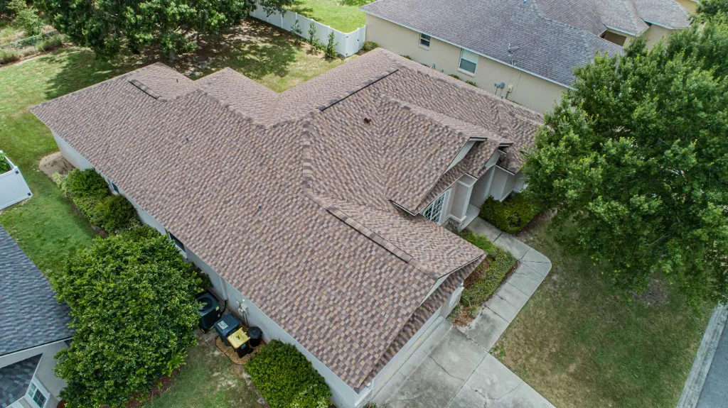 Stronghold Roofing completed a brown shingle roof on a ranch home in Naples, FL.