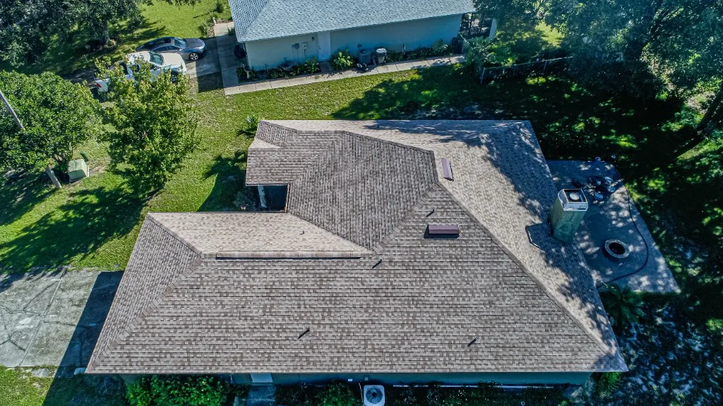 Stronghold Roofing completed a tan shingle roof with skylights in Naples, FL.