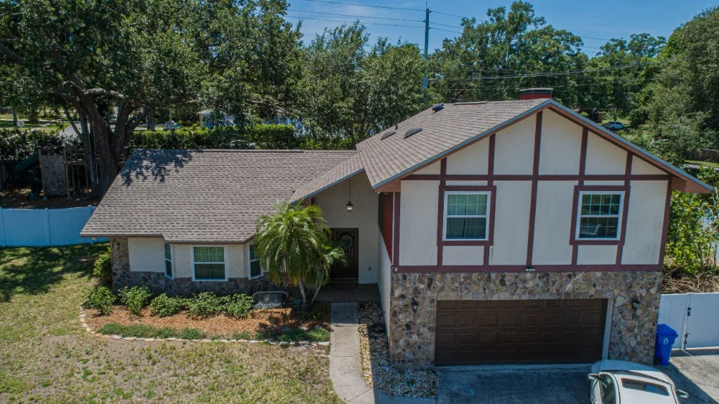 Stronghold Roofing completed a gray shingle roof on this ranch home in Orlando, FL.