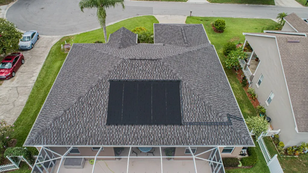 Stronghold Roofing completed a gray shingle roof with solar panels in Orlando, FL.