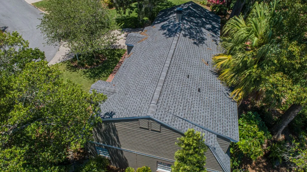 Stronghold Roofing installed a gray shingle roof on a ranch-style home in Tampa, FL.