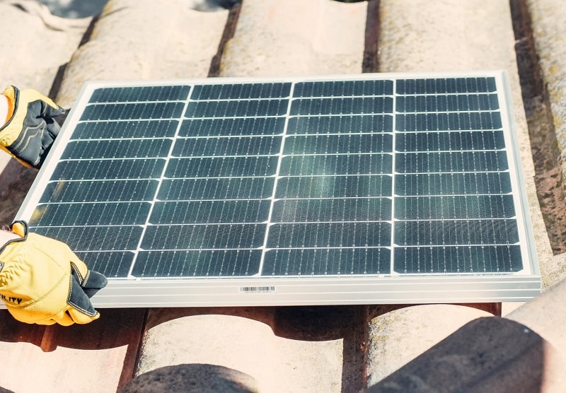 Roofer and solar panel removal
