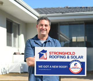 satisfied man with Stronghold roofing services