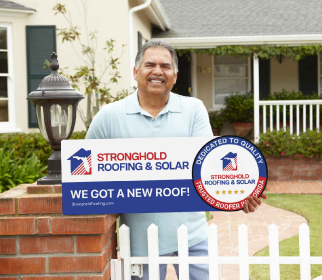A pleased client enjoying the new roof