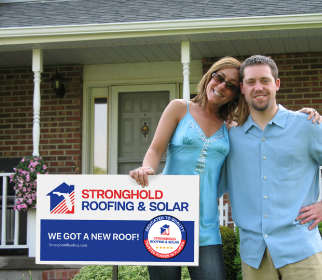 Happy client smiling because of new roof in Florida