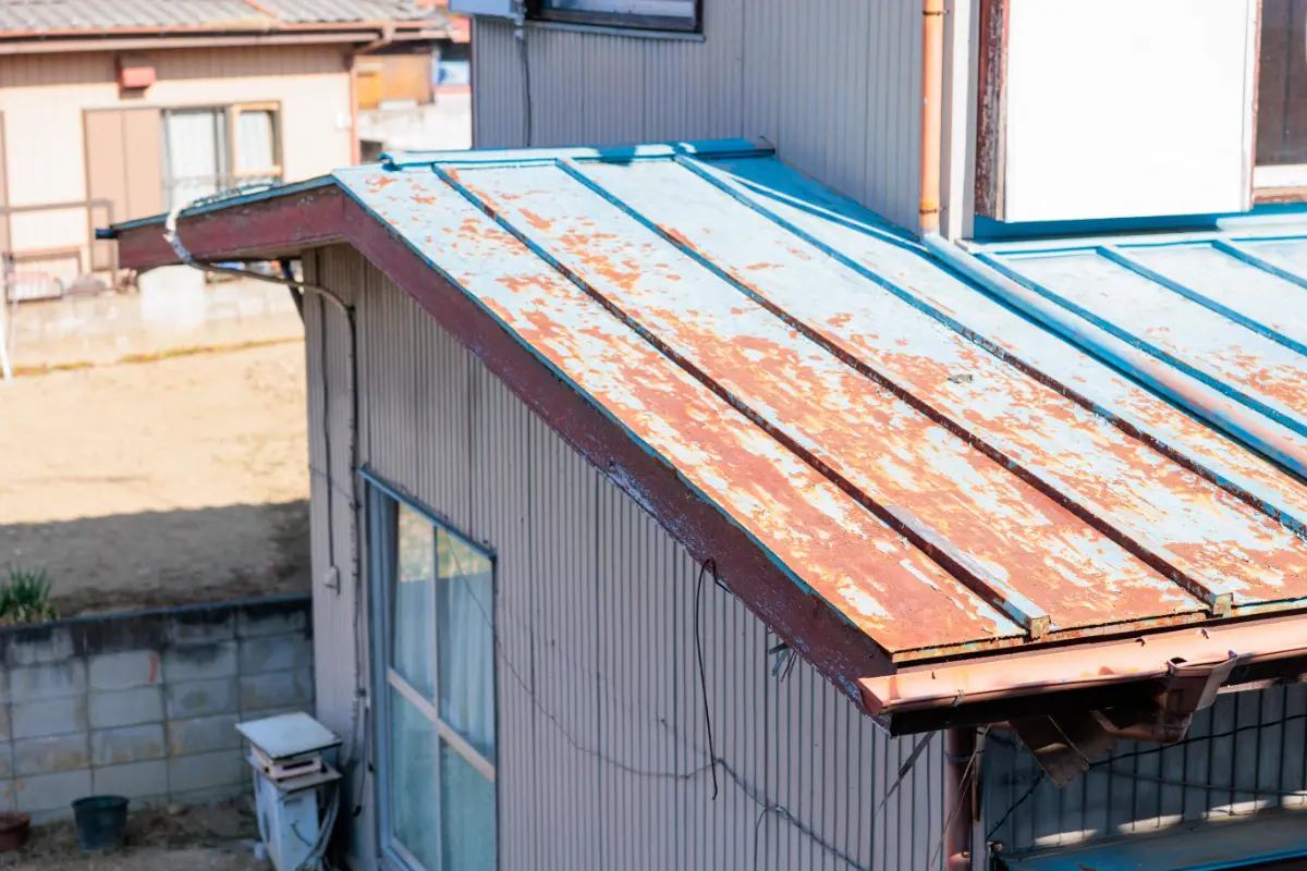 Aged metal roof with rust needs repair