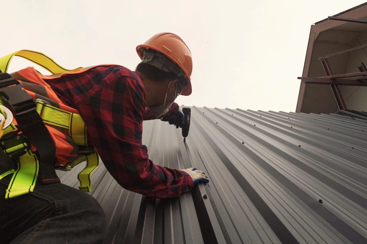 Lakeland Roofer Installing a Metal Roof Over Shingles