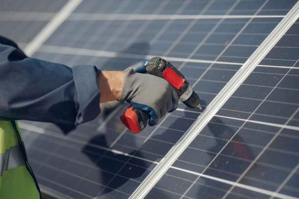 a Man near a solar panel
