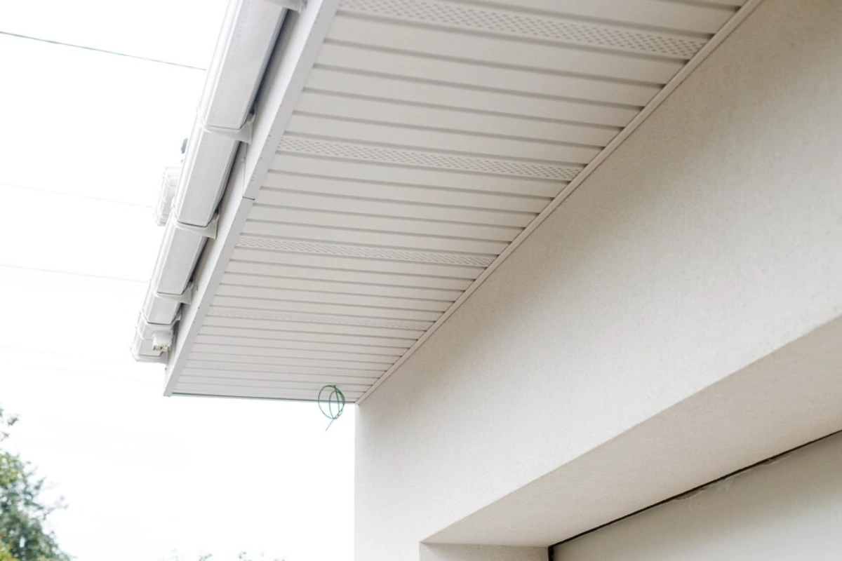 Facade renovation energy saving modern farmhouse soffit installation wooden rafters exterior